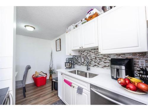 503-30 Mchugh Court Ne, Calgary, AB - Indoor Photo Showing Kitchen With Double Sink