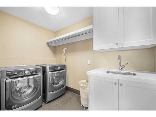 235 Coopers Hill Sw, Airdrie, AB - Indoor Photo Showing Laundry Room
