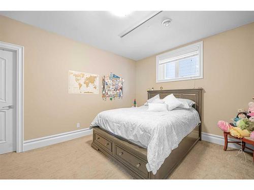 235 Coopers Hill Sw, Airdrie, AB - Indoor Photo Showing Bedroom