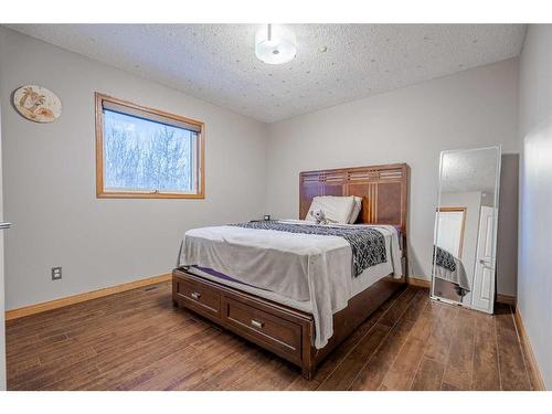 30 Rocky Ridge Landing Nw, Calgary, AB - Indoor Photo Showing Bedroom
