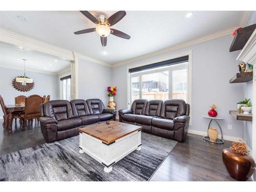 112 Kinniburgh Circle, Chestermere, AB - Indoor Photo Showing Living Room