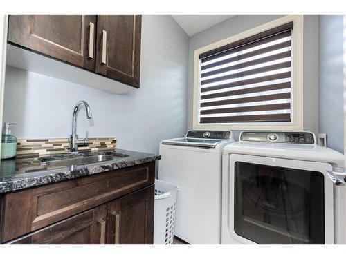 112 Kinniburgh Circle, Chestermere, AB - Indoor Photo Showing Laundry Room