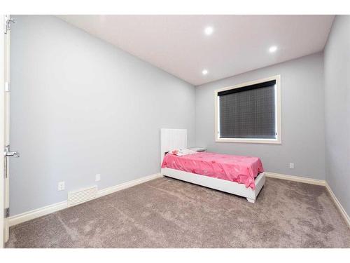 112 Kinniburgh Circle, Chestermere, AB - Indoor Photo Showing Bedroom