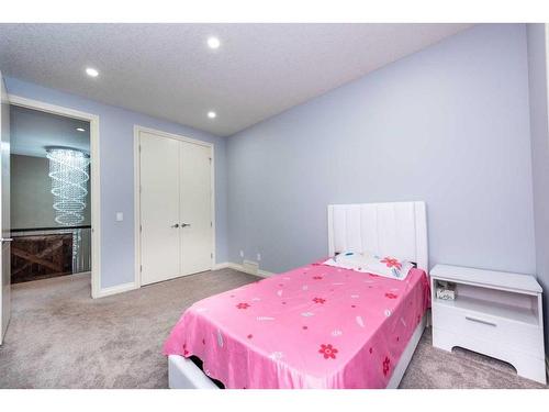 112 Kinniburgh Circle, Chestermere, AB - Indoor Photo Showing Bedroom