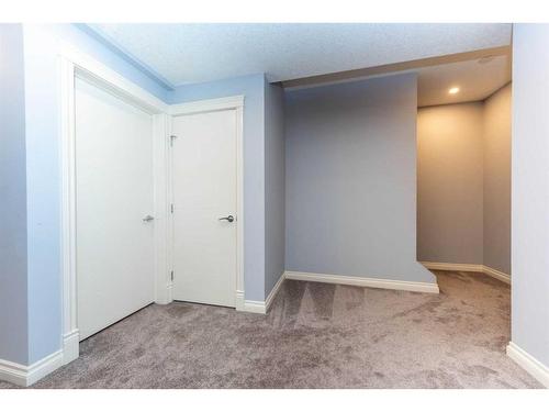 112 Kinniburgh Circle, Chestermere, AB - Indoor Photo Showing Other Room