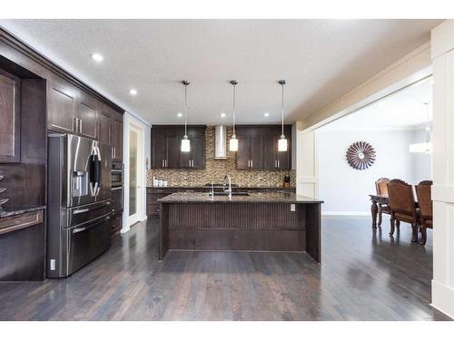 112 Kinniburgh Circle, Chestermere, AB - Indoor Photo Showing Kitchen With Upgraded Kitchen