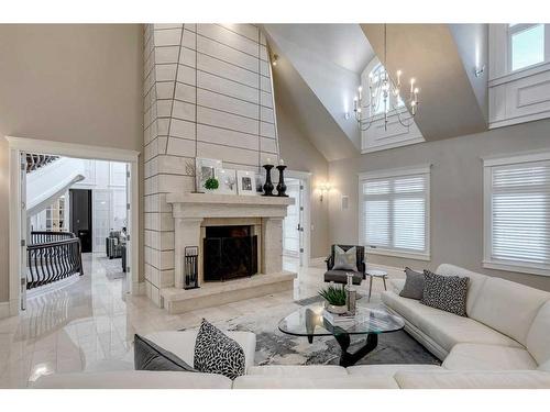44 Aspen Ridge Heights Sw, Calgary, AB - Indoor Photo Showing Living Room With Fireplace