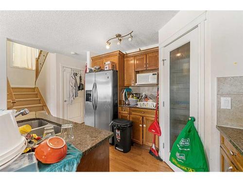 411 Taralake Way Ne, Calgary, AB - Indoor Photo Showing Kitchen With Double Sink