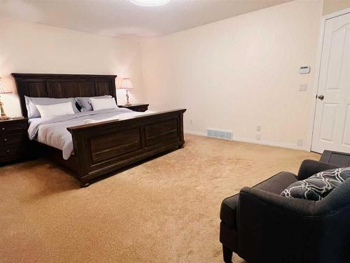 61 Arbour Vista Road Nw, Calgary, AB - Indoor Photo Showing Bedroom