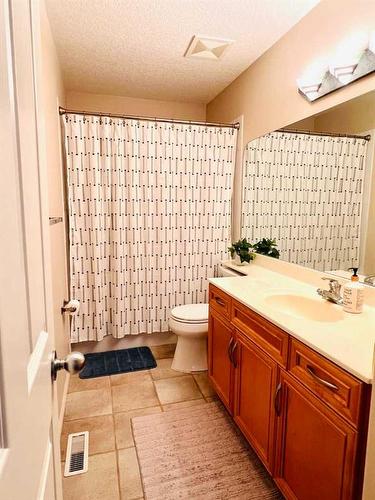 61 Arbour Vista Road Nw, Calgary, AB - Indoor Photo Showing Bathroom