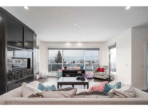 61 Arbour Vista Road Nw, Calgary, AB - Indoor Photo Showing Living Room