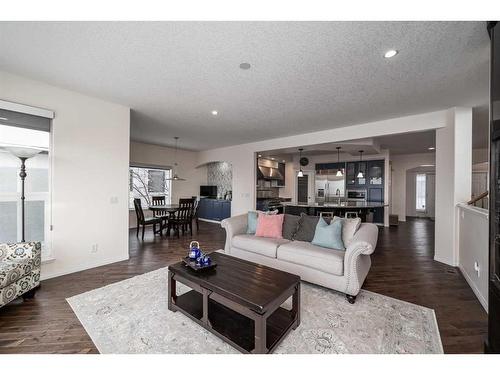 61 Arbour Vista Road Nw, Calgary, AB - Indoor Photo Showing Living Room