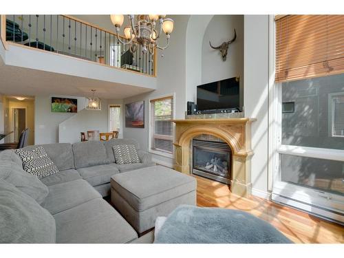 302-2306 17B Street Sw, Calgary, AB - Indoor Photo Showing Living Room With Fireplace