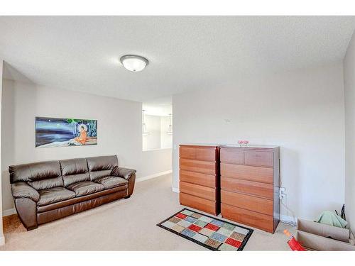 274 Covecreek Close Ne, Calgary, AB - Indoor Photo Showing Living Room