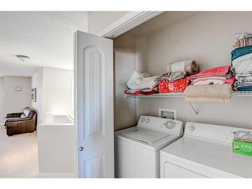274 Covecreek Close Ne, Calgary, AB - Indoor Photo Showing Laundry Room