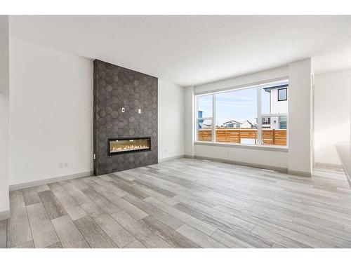 436 Dawson Circle, Chestermere, AB - Indoor Photo Showing Living Room With Fireplace