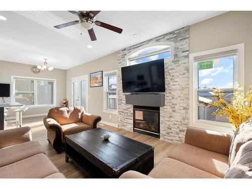 35 Saddleland Way Ne, Calgary, AB - Indoor Photo Showing Living Room With Fireplace