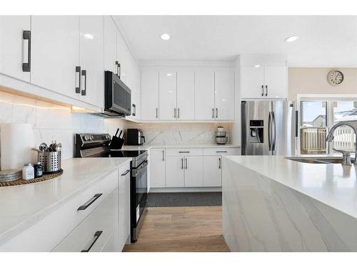 35 Saddleland Way Ne, Calgary, AB - Indoor Photo Showing Kitchen With Upgraded Kitchen