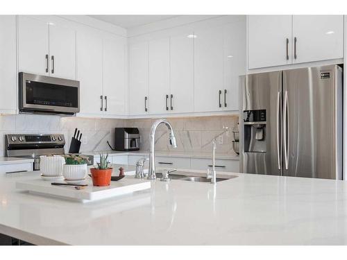 35 Saddleland Way Ne, Calgary, AB - Indoor Photo Showing Kitchen With Double Sink With Upgraded Kitchen