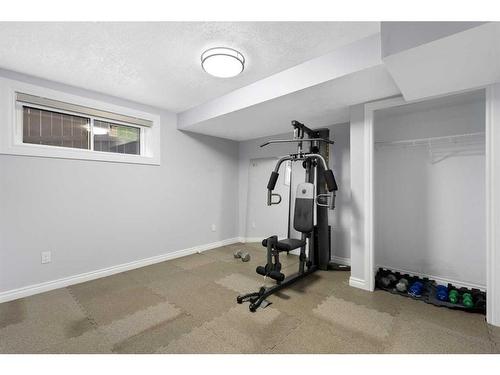 35 Saddleland Way Ne, Calgary, AB - Indoor Photo Showing Gym Room