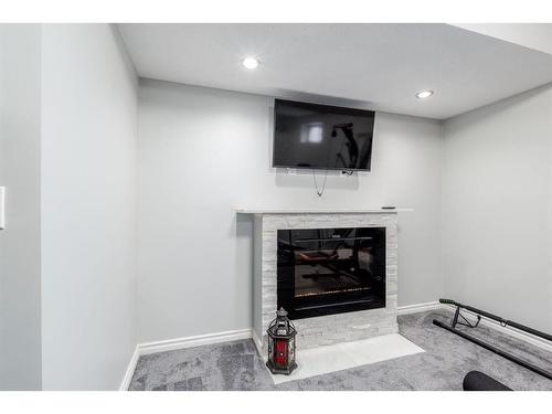 142 Cranwell Square Se, Calgary, AB - Indoor With Fireplace