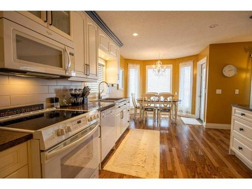 217 10 Avenue Ne, Sundre, AB - Indoor Photo Showing Kitchen With Double Sink