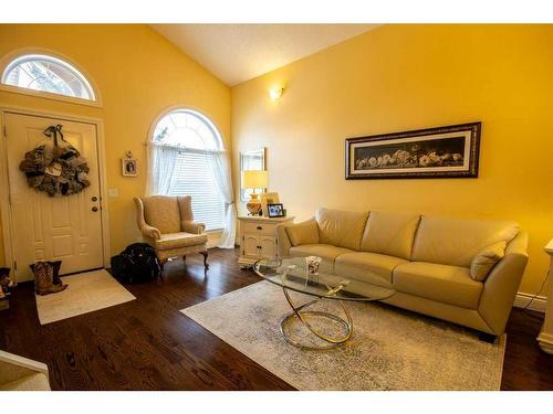 217 10 Avenue Ne, Sundre, AB - Indoor Photo Showing Living Room With Fireplace