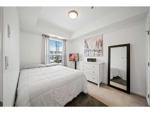 208-5040 53 Street, Sylvan Lake, AB - Indoor Photo Showing Bedroom