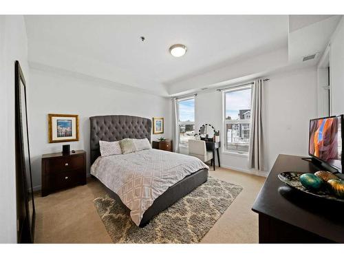 208-5040 53 Street, Sylvan Lake, AB - Indoor Photo Showing Bedroom