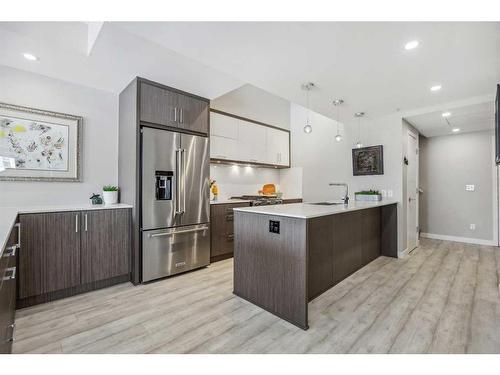 401-3450 19 Street Sw, Calgary, AB - Indoor Photo Showing Kitchen With Stainless Steel Kitchen With Upgraded Kitchen