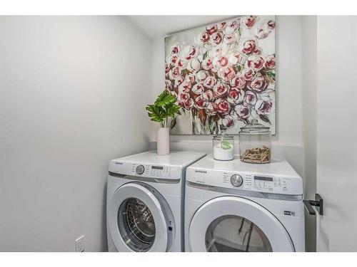 37 Shale Avenue, Cochrane, AB - Indoor Photo Showing Laundry Room
