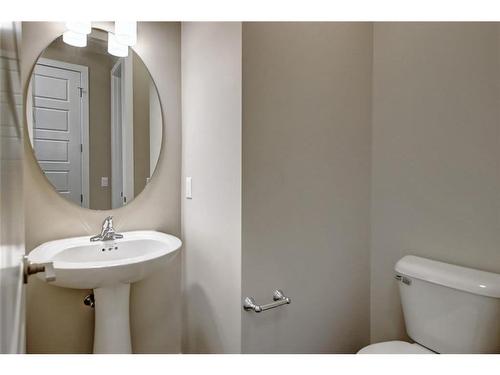 31 Precedence Green, Cochrane, AB - Indoor Photo Showing Bathroom