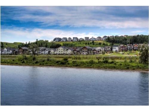 31 Precedence Green, Cochrane, AB - Outdoor With Body Of Water With View