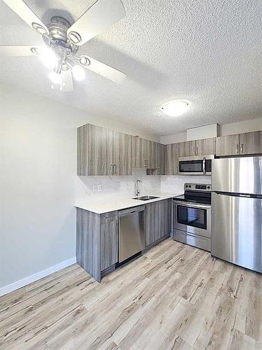 2310 17A Street Sw, Calgary, AB - Indoor Photo Showing Kitchen