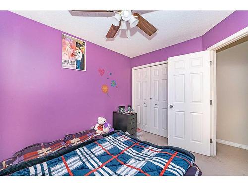 162 Saddlecrest Close Ne, Calgary, AB - Indoor Photo Showing Bedroom