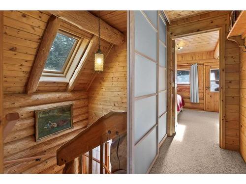 64 Breezewood Bay, Rural Rocky View County, AB - Indoor Photo Showing Bedroom