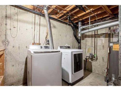7642 24 Street Se, Calgary, AB - Indoor Photo Showing Laundry Room