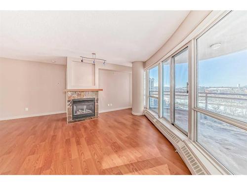 1305-1078 6 Avenue Sw, Calgary, AB - Indoor With Fireplace