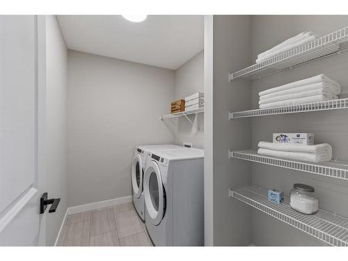 82 Belvedere Green Se, Calgary, AB - Indoor Photo Showing Laundry Room