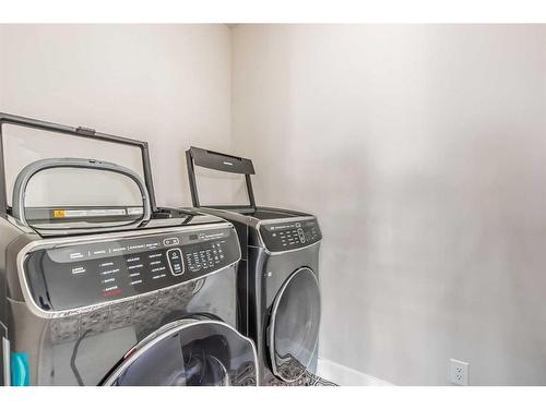 235 Carringham Road Nw, Calgary, AB - Indoor Photo Showing Laundry Room