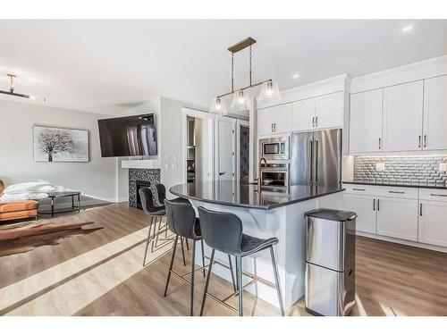 235 Carringham Road Nw, Calgary, AB - Indoor Photo Showing Kitchen With Stainless Steel Kitchen With Upgraded Kitchen