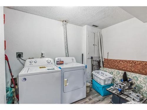 52 Falton Drive Ne, Calgary, AB - Indoor Photo Showing Laundry Room