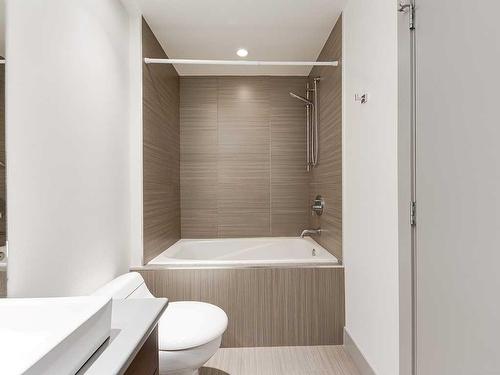 101-1707 27 Avenue Sw, Calgary, AB - Indoor Photo Showing Bathroom