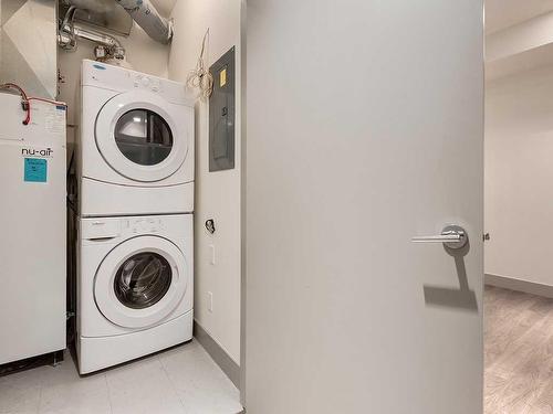 101-1707 27 Avenue Sw, Calgary, AB - Indoor Photo Showing Laundry Room