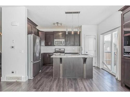 17 Covecreek Mews Ne, Calgary, AB - Indoor Photo Showing Kitchen With Upgraded Kitchen