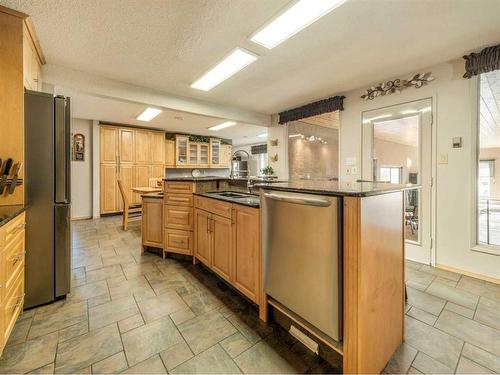 440 2 Avenue Ne, Milk River, AB - Indoor Photo Showing Kitchen With Stainless Steel Kitchen With Double Sink