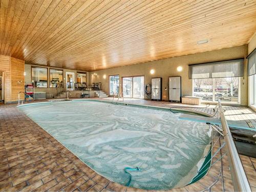 440 2 Avenue Ne, Milk River, AB - Indoor Photo Showing Other Room With In Ground Pool