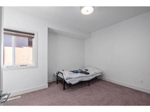 5228 Bowness Road Nw, Calgary, AB - Indoor Photo Showing Bedroom