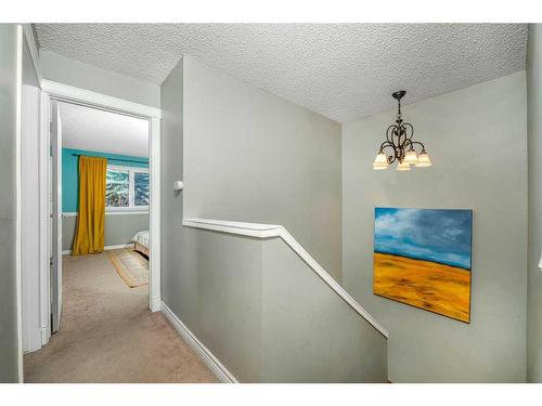 68 Stradwick Rise Sw, Calgary, AB - Indoor Photo Showing Other Room