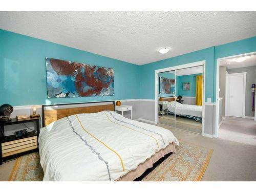 68 Stradwick Rise Sw, Calgary, AB - Indoor Photo Showing Bedroom